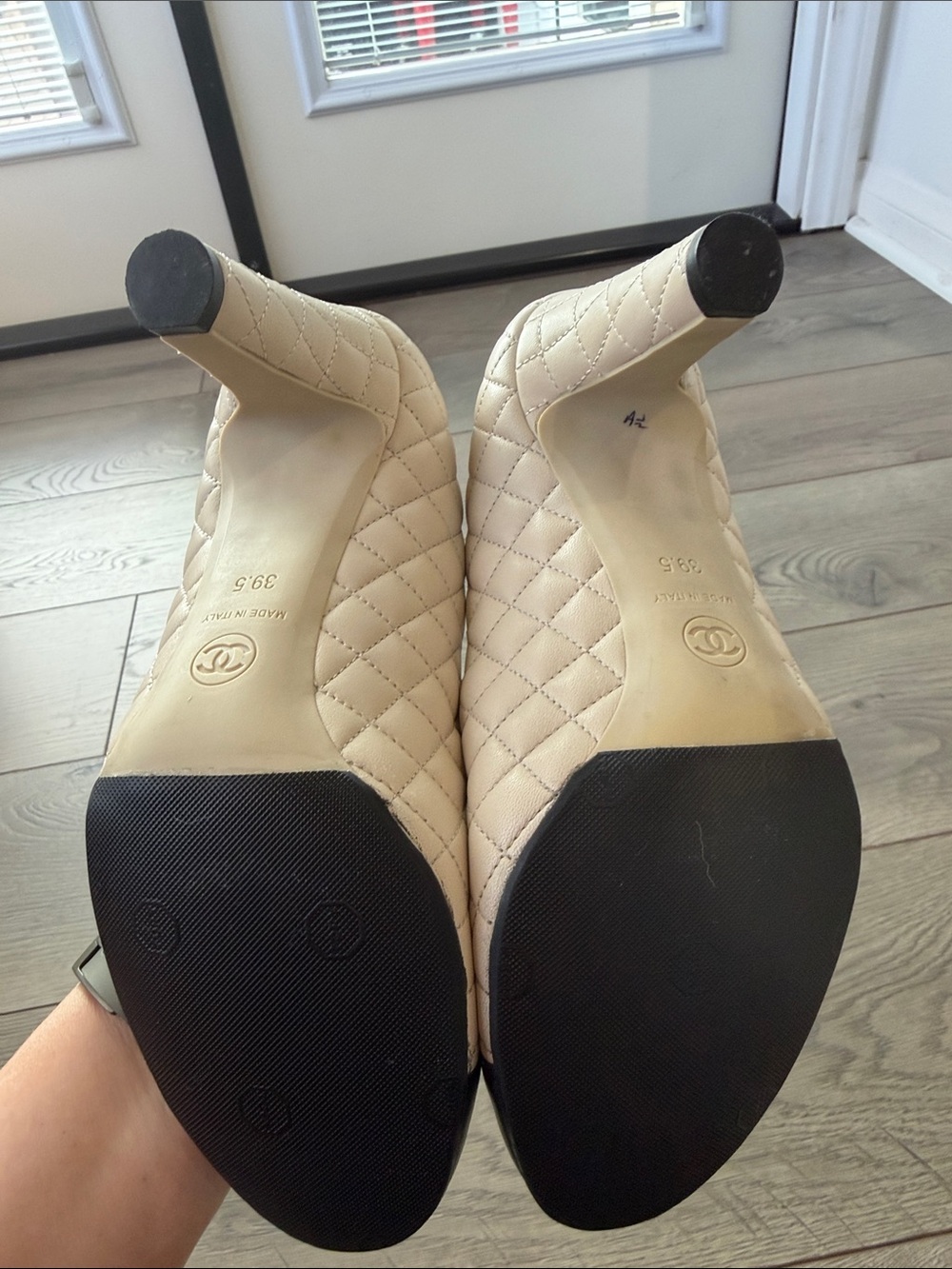 CHANEL Quilted Camellia Cap-Toe Pumps in Cream and Black - Picture 6 of 6